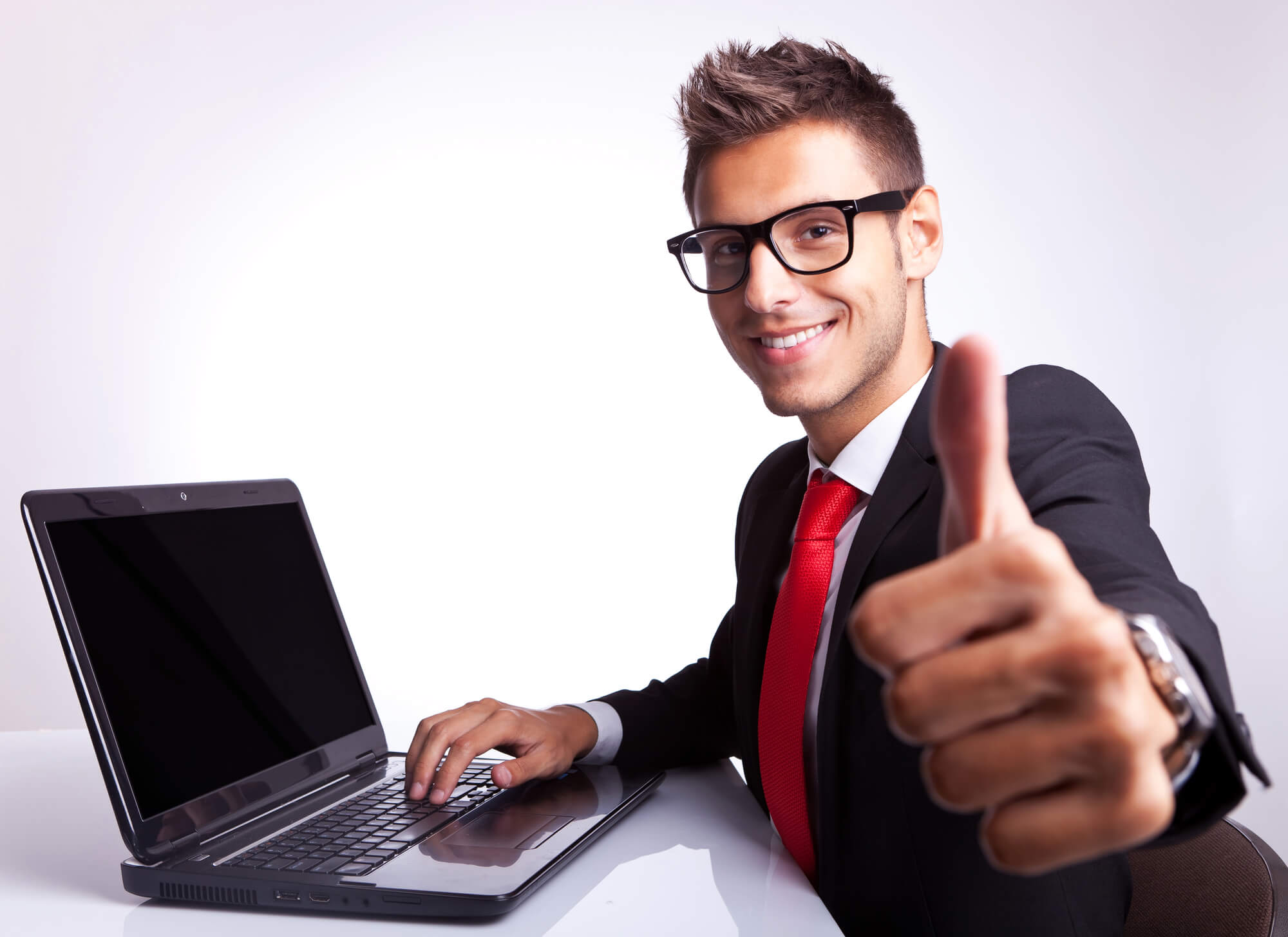 business person giving a thumbs up sign after buying an insurance agency